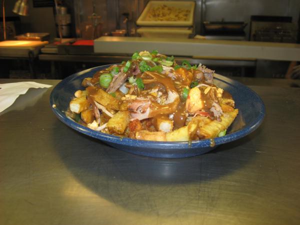 Dinosaur_BBQ's tweet image. With the weather turning colder, do you want to know what would hit the spot? #Poutine from the #Dinosaur_BBQ. #Yum