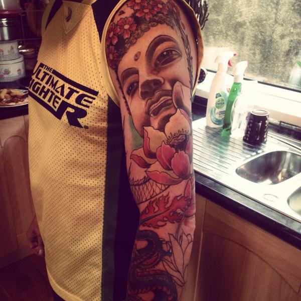 CombatAthletic_'s tweet photo. #thai #sleeve #tattoo coming along nicely, looking forward to the final result #buddha #thailand #flower #dragon http://t.co/QXVXz6MGdr