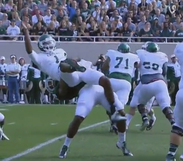 BleacherReport's tweet photo. VIDEO: Michigan State DE Shilique Calhoun body slams a QB, and Jim Ross calls it. http://t.co/it3QyD0mV9 http://t.co/vw1LfTF6Rt