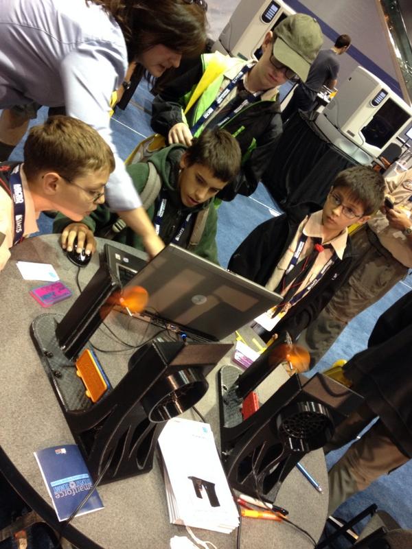 GregoryAJones's tweet photo. We have a group of @boyscouts participating in the #3dprinting http://t.co/j9r8FbvZX2 challenge at #IMTSsummit. #STEM http://t.co/nRTA7XoTBu