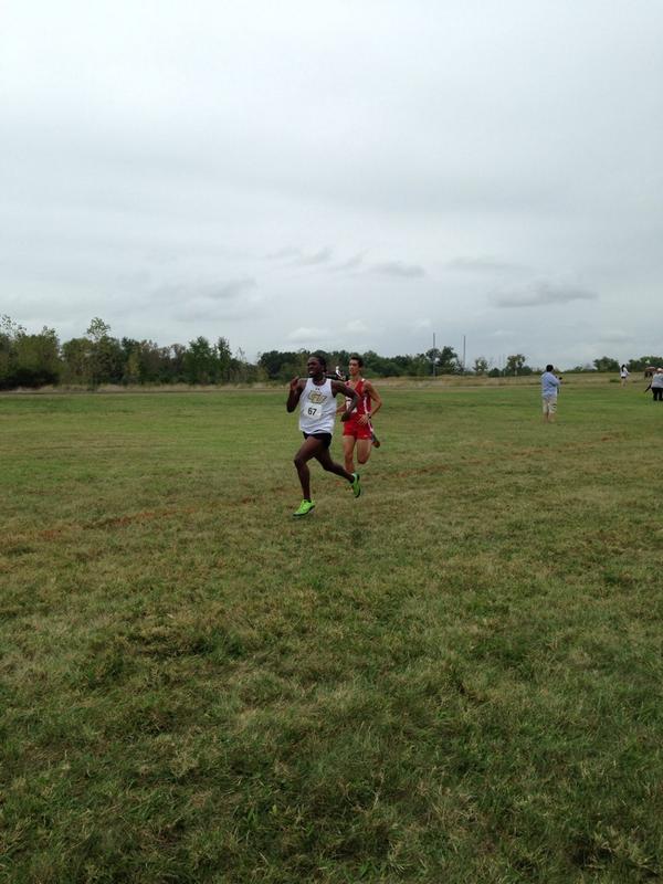GallaudetBison's tweet photo. #Gallaudet's Alex Close passes a @cuacardinals runner at the finish to place 5th in 29:19.0. #neac #BisonInvitational http://t.co/IyrZ0Kg5eu