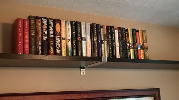 cachedog13's tweet photo. @JohnGrishamFans Finally elevated the collection to the level I deserves http://t.co/03MAm8h6UG