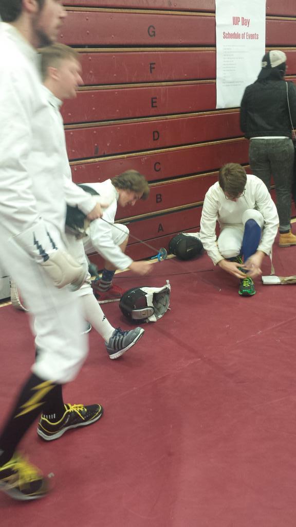 iupfencingprobs's tweet photo. Fencers getting ready to fence. It is a delicate yet tedious process.... #fencingproblems http://t.co/N15Dto9bkX