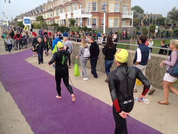 triweymouth's tweet photo. Swimmers coming out into transition for the bikes! #challengeweymouth #swimtobike http://t.co/jvPPf0vzUD