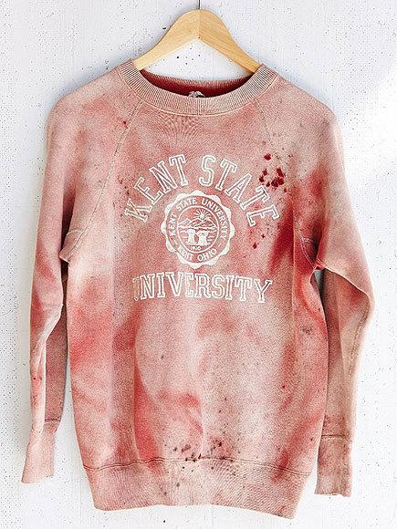 Complex's tweet image. Urban Outfitters is in hot water for selling vintage, blood-stained Kent State sweatshirt: trib.al/NfI7zOF