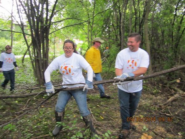 Stantec's tweet photo. Green Bay’s Alissa Wilinski &amp; John Wiater team up for clean up along WI’s Fox River Trail #StantecintheCommunity http://t.co/ifZsMRIHHe
