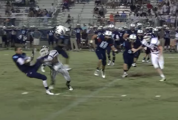 BleacherReport's tweet photo. VIDEO: A Tennessee commit channels his inner Jadeveon Clowney with a helmet-popping hit http://t.co/JtfZfIkh2Y http://t.co/018t0BbvGf