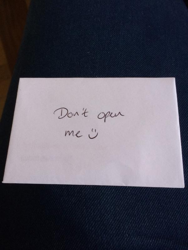 Lapi_Daria's tweet photo. A closed envelope that says "don't open me"... Is this some sort of test? #smashingconf http://t.co/NxNPL3gwfQ