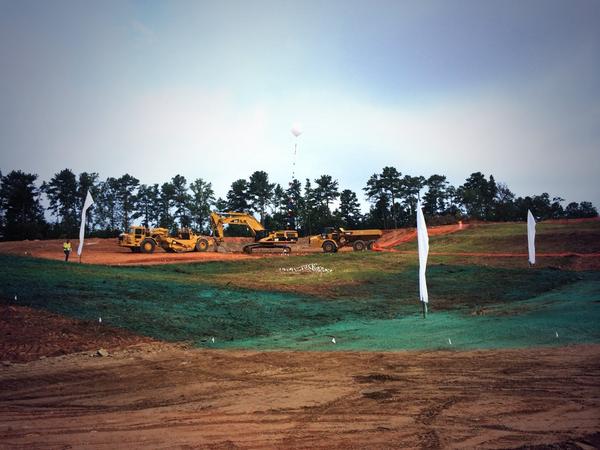 The white balloon represents home plate  &amp; each flag is a base. A baseball field in the making!