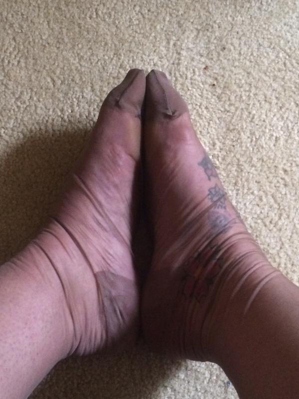 stockinged secretary on twitter tired feet and wrinkled stockings