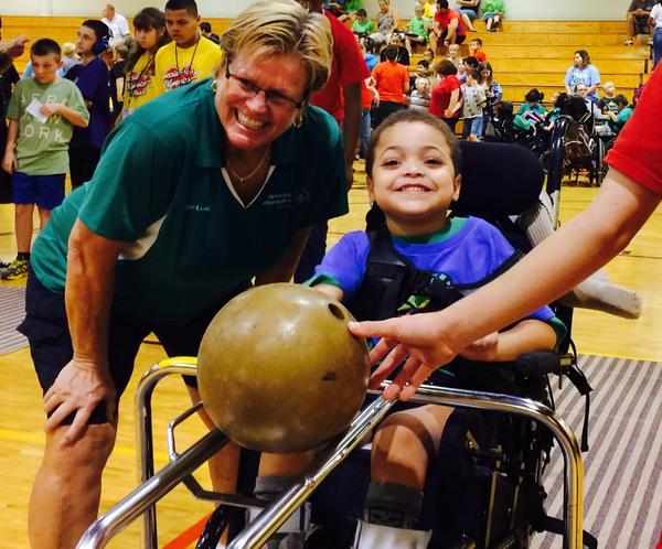 Coach Val and student ready for ramp bowling.