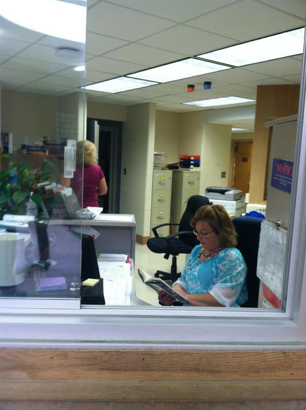 whitfabb's tweet photo. Office staff reading it up during WIN time #lms_spirit #arrowpride http://t.co/uTxxUp1xJ2