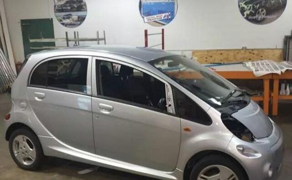 AllOutCanvases's tweet photo. We turned this Mitsubishi i-Miev into a rolling lightning storm! The #WrapNinjas of #BloNo have done it again! http://t.co/8CvRkeh2FM