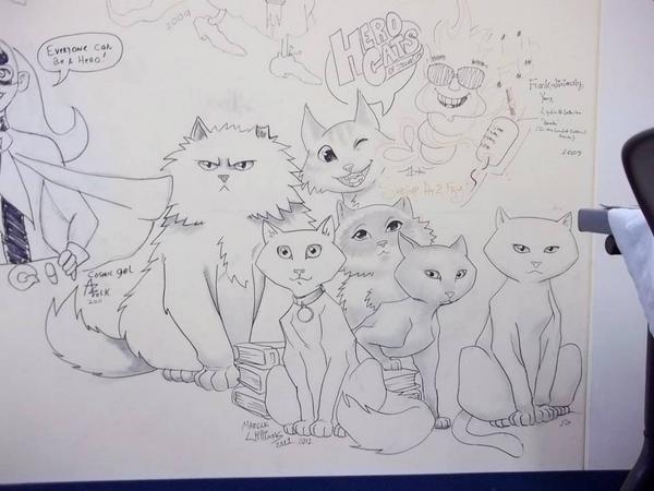 HeroCatComics's tweet photo. The wall of the Bull St. Library in Savannah, GA #herocats #cats #liveoakpubliclibrary #comics http://t.co/vokAg5iUli
