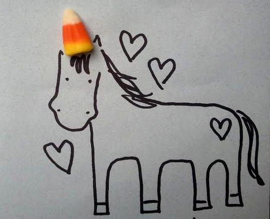My royal unicorn Sparkles loves candy corn treats. She gets so funny! OFFICAL APPROVED PHOTO: