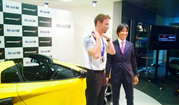 McLarenF1's tweet photo. JB dons Olympic ski jumper Noriaki Kasai’s gold medal in Tokyo last night. #NiceBling #Mobil1Insider #JapaneseGP http://t.co/SrKJfpw4KM