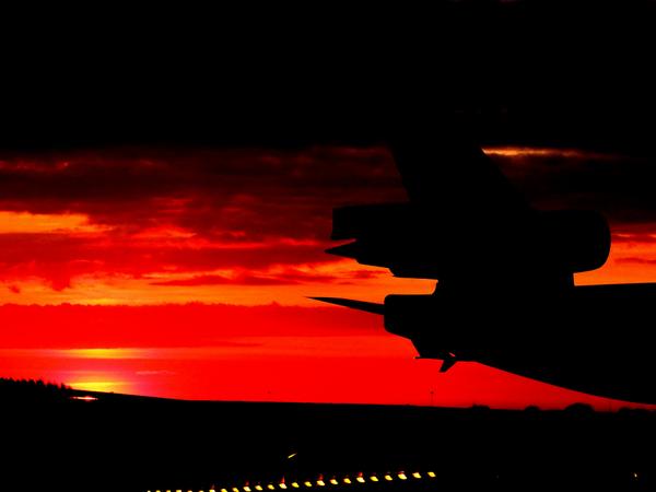 SchipholSpot's tweet photo. KLM MD-11 on taxiway V with a lovely sunset http://t.co/f4TlRLLRdf