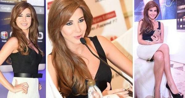 Bitajarod's tweet photo. نانسي عجرم أطلقت حملة هواتف HUAWEI على أنغام رائعتها "نام بقلبي" رسميًّا من دبي 
http://t.co/NNigxZL2bJ
@NancyAjram http://t.co/ZZNyHr9hlS