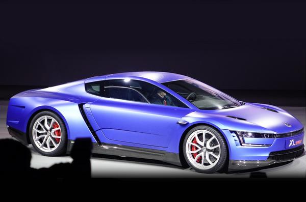 autocar's tweet photo. VW reveals 167mph Ducati-engined XL Sport concept http://t.co/lAQ1Z2qJ02 #MondialAuto #ParisMotorShow http://t.co/nvJrFtUpWw