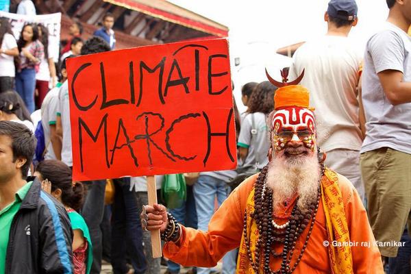 Avaaz's tweet photo. From Kathmandu to NYC, the #PeoplesClimate march isn't just a political act - it's an act of LOVE. http://t.co/UO7fQUXekm