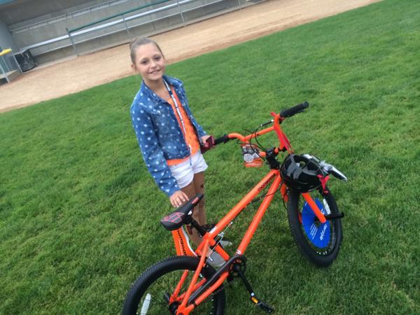 sppdmn's tweet photo. She was about as proud as any winner could be and the bike she won matched her shirt. Thanks @Target #sppdcommunity http://t.co/RUdRmqIRbJ
