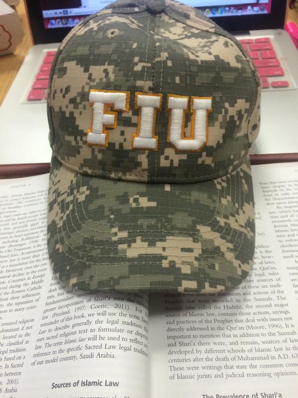 atomicb0mbshell's tweet photo. 100 on my cyber crime test and fiu hats from my residents ๐ going to sleep happy โบ๏ธ #alphaAs http://t.co/r1lJhN8vak