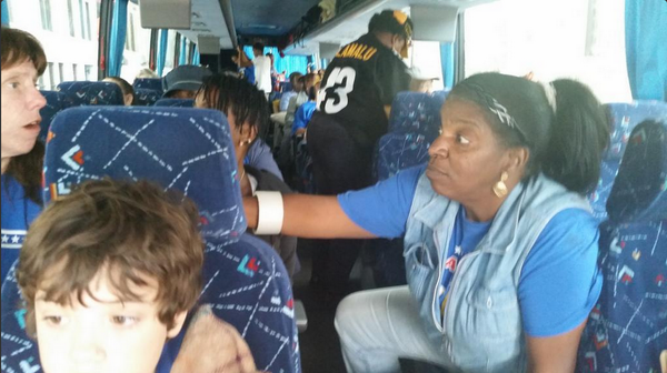 ActionUnited's tweet photo. #ActoinUnited's Ms.Hazel, #SWPA regional president talks #ClimateJustice.on bus to #PeoplesClimate march #DNClimate http://t.co/9lO48GyymI