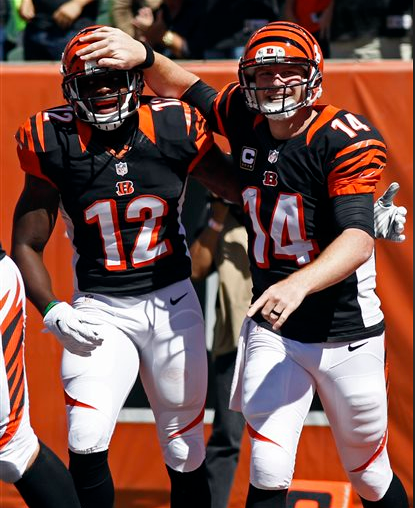 Bernard 2 TD rush, Dalton TD catch in Bengals 33-7 win over Titans bit.ly/1AZZAtc