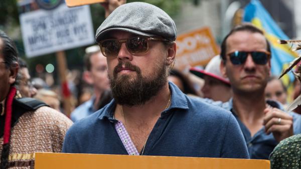 Variety's tweet photo. .@LeoDicaprio and @MarkRuffalo joined the climate change march in NYC today. http://t.co/aGGpXxXP3R http://t.co/5DI9O8O9gJ