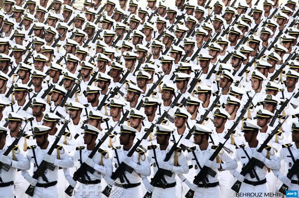AFPphoto's tweet photo. #Tehran Iranian Naval troops march during the annual military parade marking the Iran-Iraq war. Photo: @BEHROUZZZZ http://t.co/bKQZgzlG02