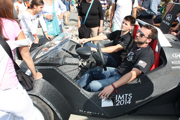 ElectronicDesgn's tweet photo. Chilling out in @localmotors' #3dprintedcar at @makerfaire #WMF2014 http://t.co/LO6bAVyiPL