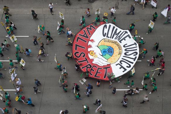 Reuters's tweet photo. PHOTOS: Marches around the world mark the international day of action on climate change. http://t.co/luTRDFdgr1 http://t.co/Ad2bV5vpla