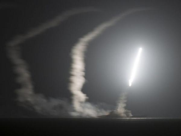 USATODAY's tweet image. USS Philippine Sea launches missiles against ISIL targets in Syria usat.ly/1uAsduG (E. Garst, U.S. Navy/epa)