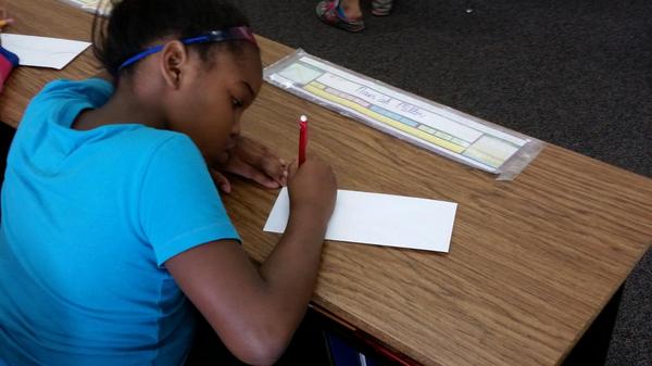 pmmullin's tweet photo. @SHESWildcats We're learning how to address an envelope that we are sending to our pen pals in Long Island, NY! http://t.co/XrQSMs4kBt