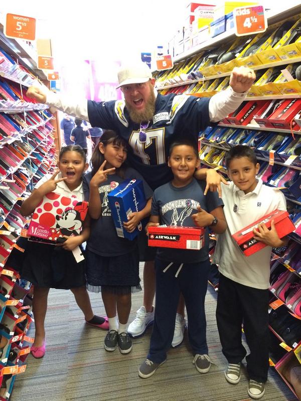 Having a blast helping kiddos shop for new shoes at the 26th Annual Back to School Shoe Drive. #GivingBack #Chargers