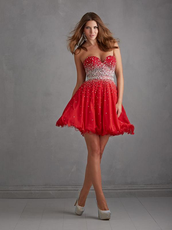 NightMovesProm's tweet image. A flirty ruffled hemline and sparkling beadwork makes Style 7211 truly perfect.