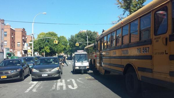 nycphotog's tweet photo. Cop writing summonses for all vehicles double parking along 15th Ave now. #brooklyndrivers http://t.co/hBohkYWc0q