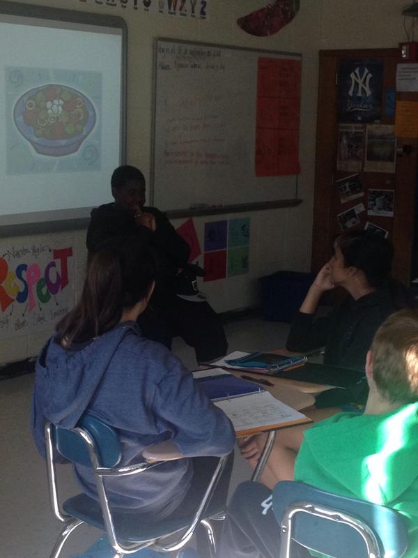 brittliz7's tweet photo. 8th graders in the "hot seat" while their peers describe the vocab word shown using only spanish clues. #RIPPIB http://t.co/w9vpm1JOi6