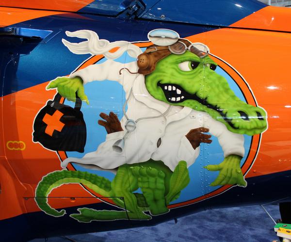 verticalmag's tweet photo. Gotta love the @ShandsCair logo. Photo by our @aparker77, roaming the floor at #AMTC14. @AirbusHC_usa http://t.co/A45wg2fQ6T
