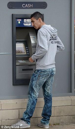 Di Maria on cash machine spotted at grocery store in Alderley Edge in Cheshire.