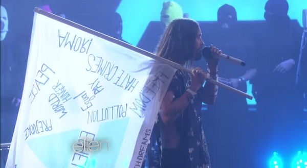 gramoflove6277's tweet photo. Amor, Peace, Prejudice, World Hunger, Pollution, Hate Crimes. #MarsFlag at @TheEllenShow Love it! @30SECONDSTOMARS http://t.co/y75Ko4JywW