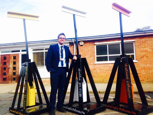 CamoLearning's tweet photo. Principal @gallottwayland @WaylandAcademy proudly displays his array of trebuchets #STEMMayhem #TrebuchetThursday http://t.co/iv2TjFhKix