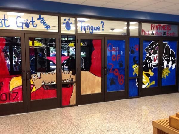 Spectacular artwork by Elwood students on Jr-Sr High front entrance for homecoming! Awesome job!!