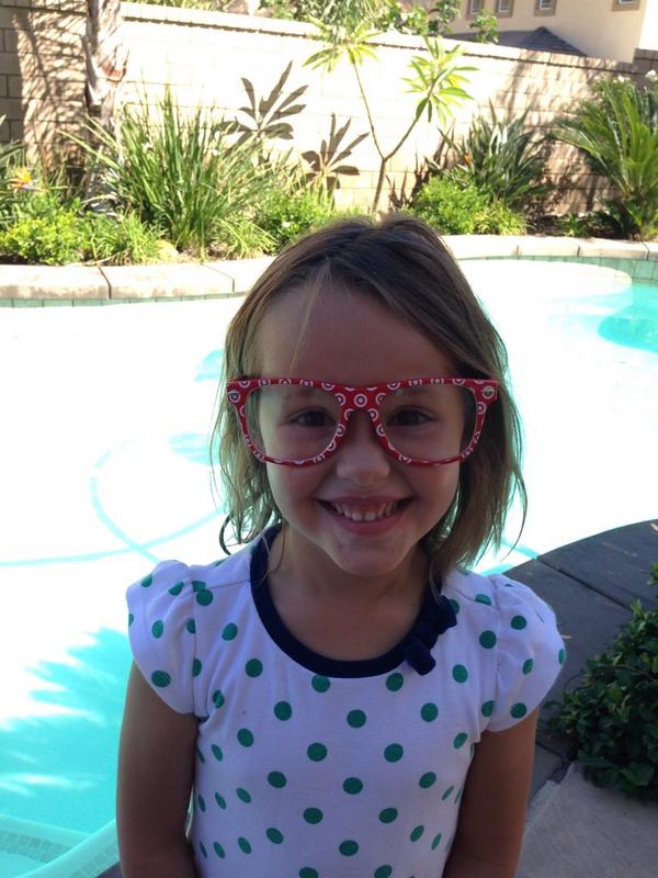 Amy loves her Target Bullseye glasses. I see a future cashier and a REDCard machine! #TargetLife #D244friendlyin2