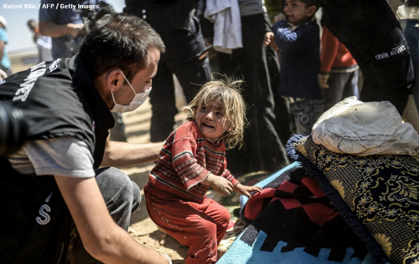 ABC's tweet image. Syria's smallest refugees flee from ISIS: abcn.ws/1viXCn7