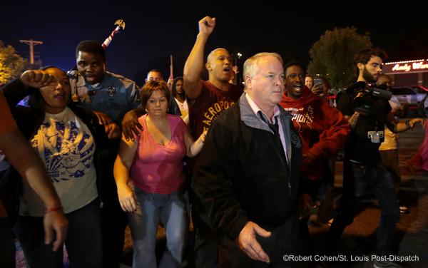 uncutcolombiancoke:  thepoliticalfreakshow:  BREAKING: Peaceful Protesters In Ferguson MO Get Pummeled By Police Officers After Their Chief Marched With Protesters  I think the #ferguson PD is aggressively attacking protestors because they assume @CNN