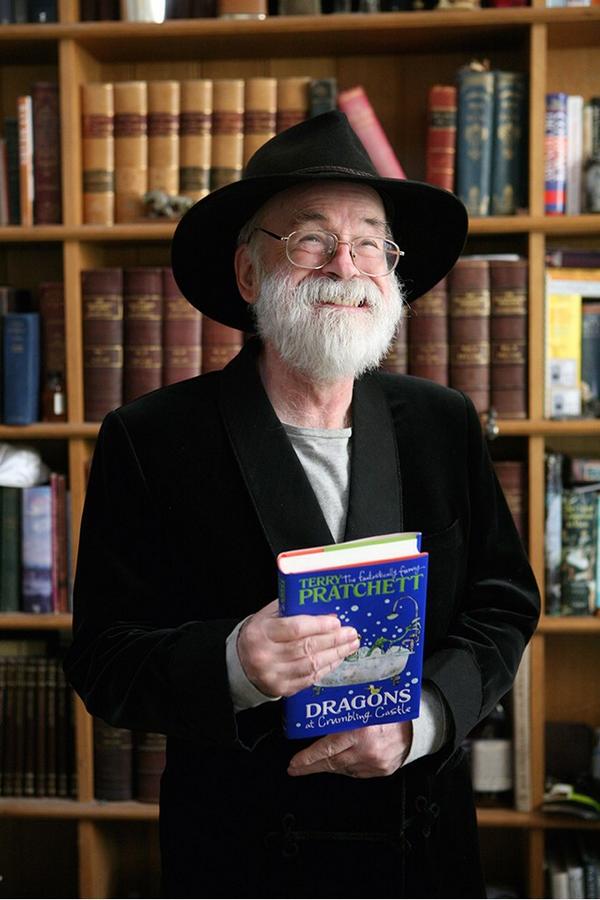 RHKidsUK's tweet image. The Fantastically Funny Terry Pratchett celebrating his DRAGONS No.1! bit.ly/1vanCRo @terryandrob