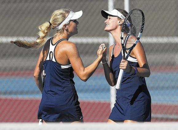 Tough match for <a href="/NhhsTennis/">NHHS Girls Tennis</a> yesterday, but nice picture of @KendallCosenza and <a href="/annaaburke/">Anna Burke</a> by Scott Smeltzer.