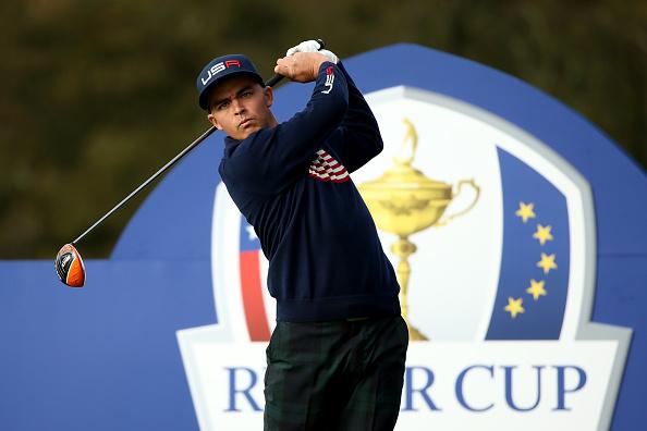 PGATOUR's tweet image. From the rough, Rickie carves a 3-wood on the green at the par-5 18th. McIlroy and Walker both miss from fairway.