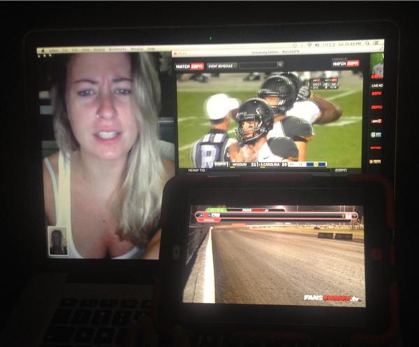 ChelseaGatesTV's tweet photo. Multitasking at its finest....and despite the look on her face, my friend really loves me. #MIZZvsSC #racingstuff http://t.co/R8O6Y3kh5Y